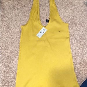 NEW RIBBED EXPRESS V NECK TOP IN MUSTARD.